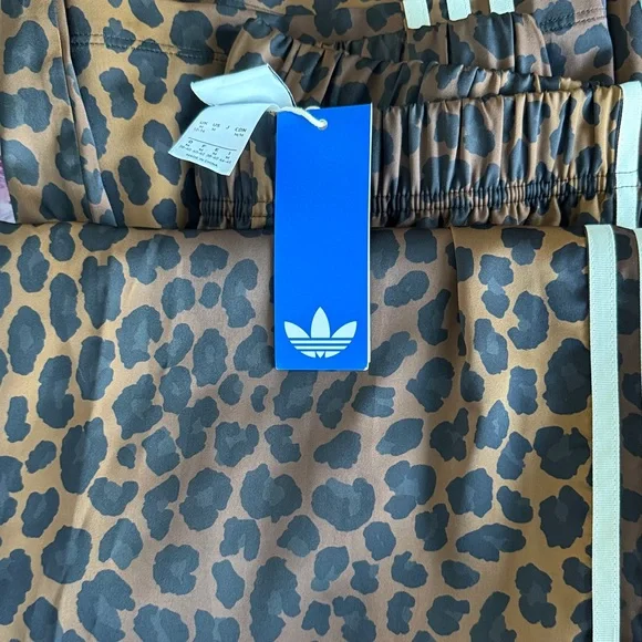 WOMEN'S ADIDAS ORIGINALS LEOPARD FIREBIRD OVERSIZED TRACK PANTS - Picture 4 of 5